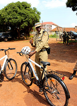 UPF officer Dennis Egesa shown here with one of the new bikes