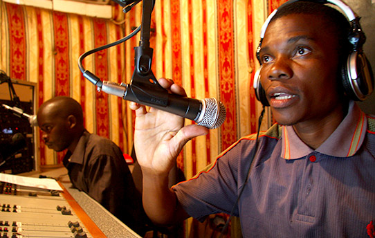 DJs Stephen Mweka and Paul Sakamoyo broadcast from Radio Mano in Kasama, Zambia